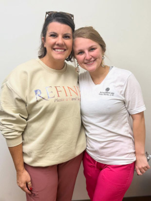 BOA Plastic Surgery practice staff with female patient in Jackson, MS